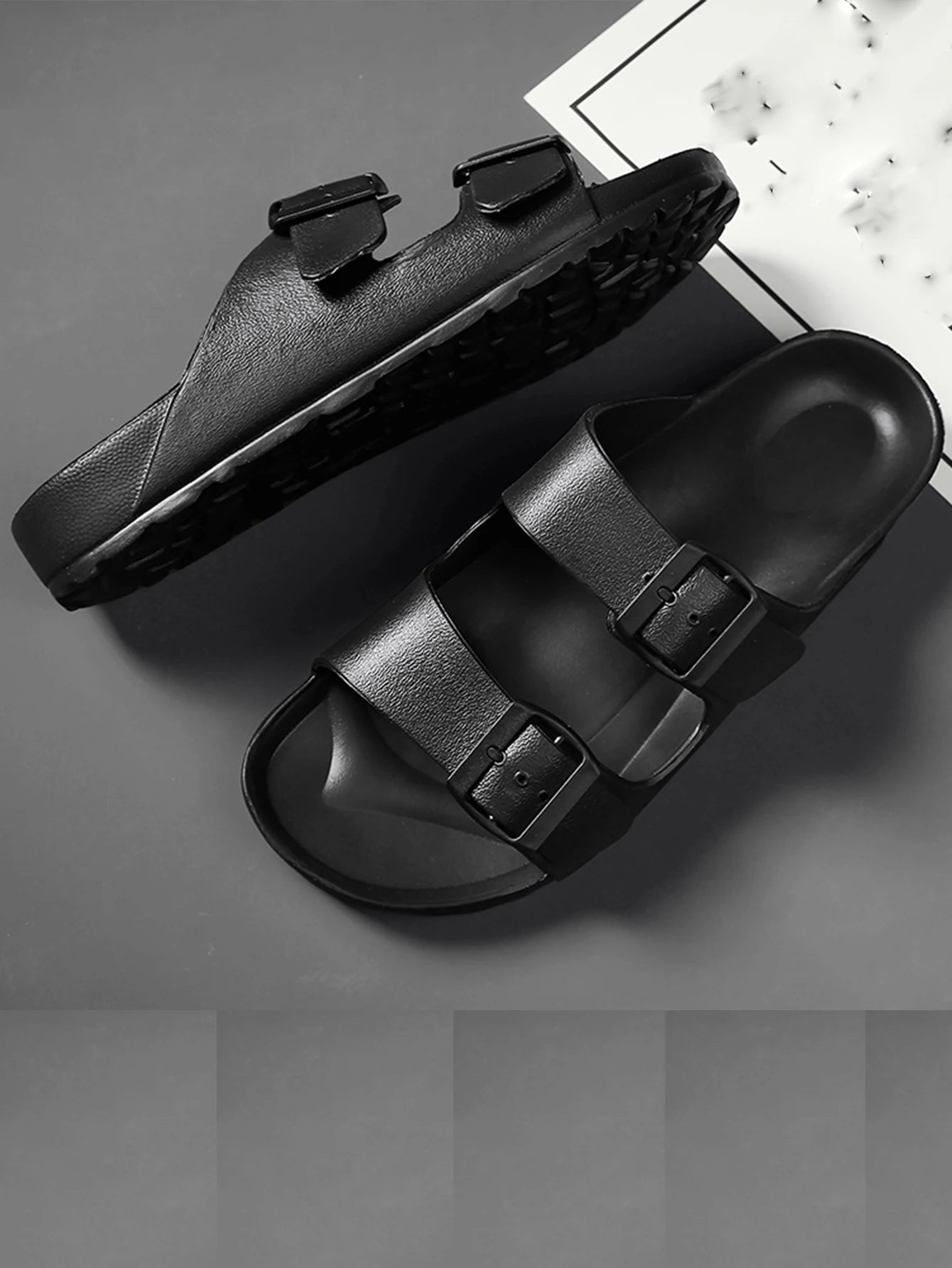 Pantoufles double boucles couleur noir