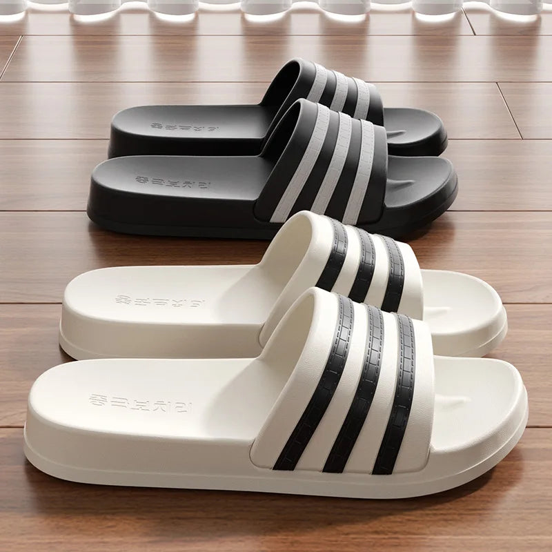 chausson pantoufle couleur blanche et noir